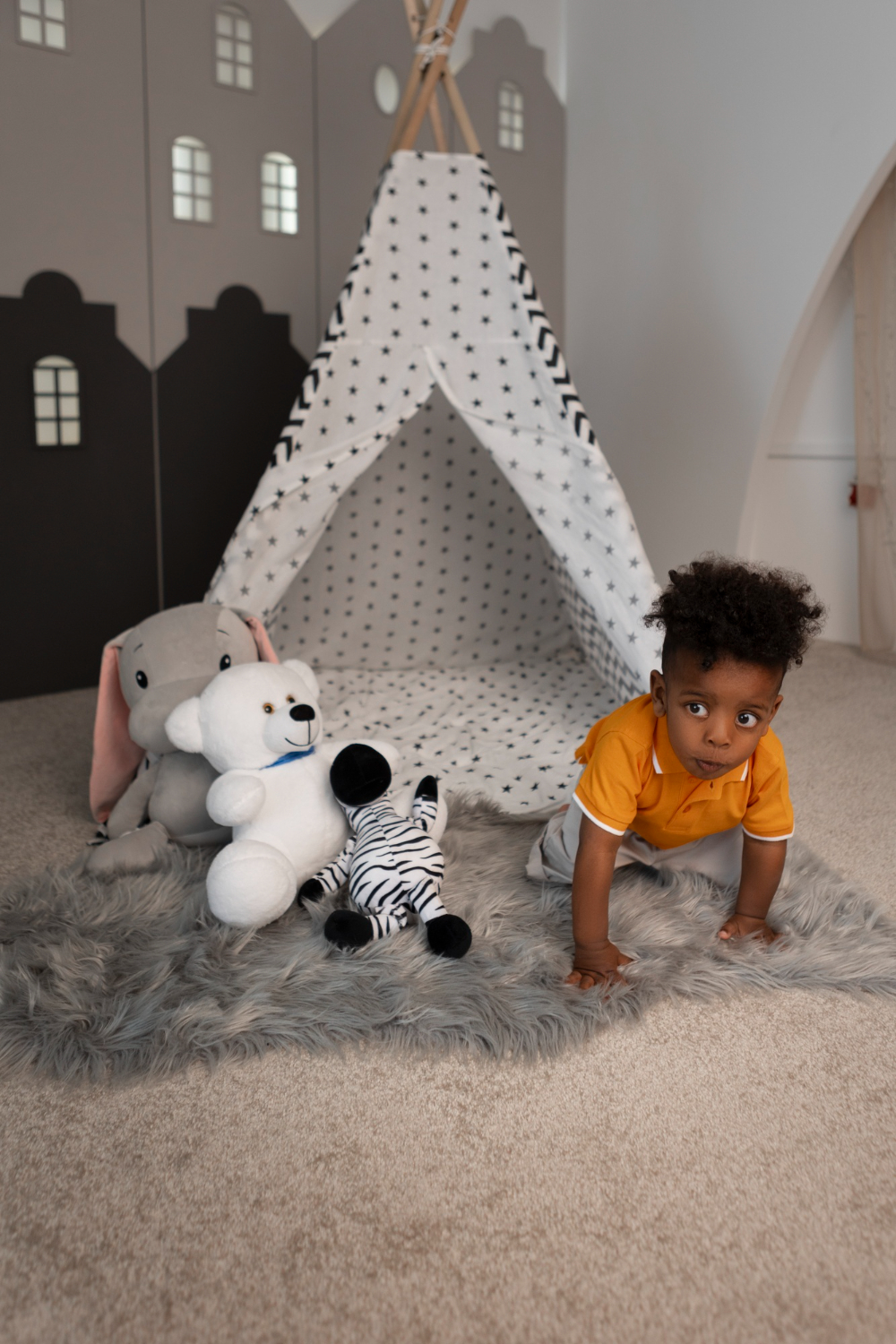 image of a baby in a baby play space