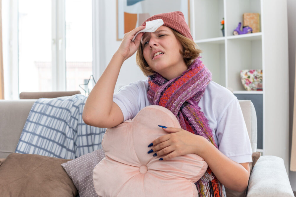 A mom placing her palm on her forehead
