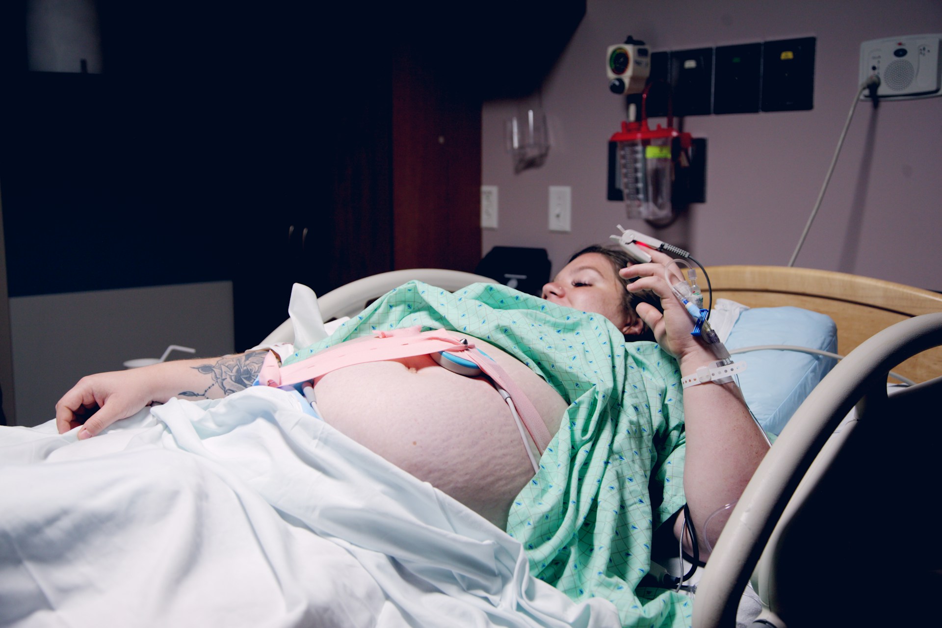 pregnant woman in hospital bed