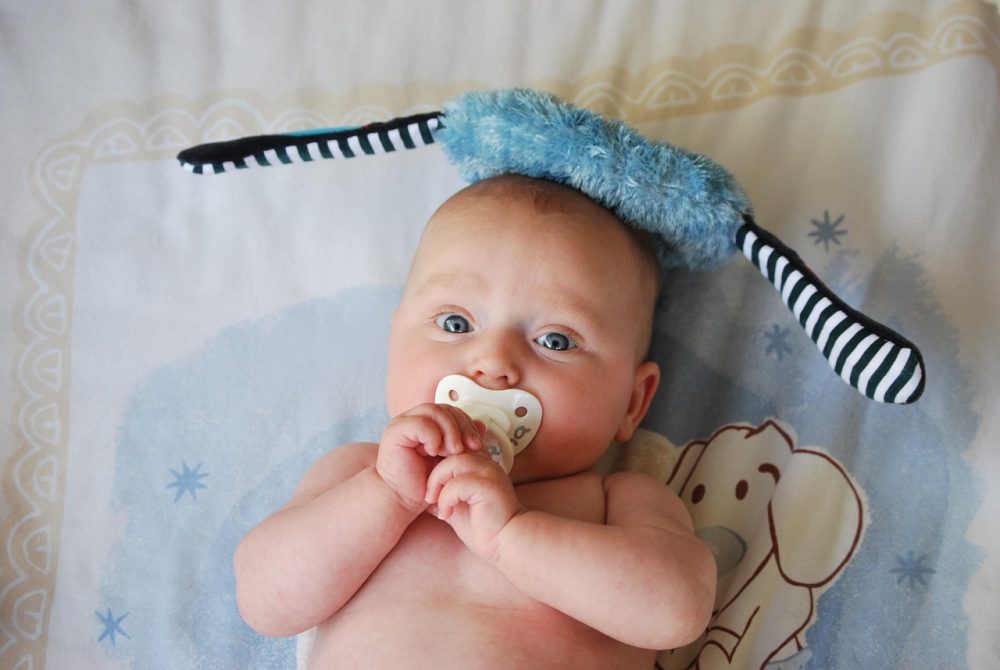 image of a baby using a pacifier