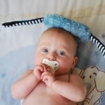 image of a baby using a pacifier