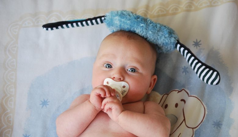 image of a baby using a pacifier