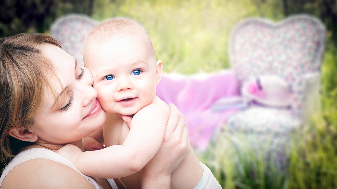 image of a mom holding her baby