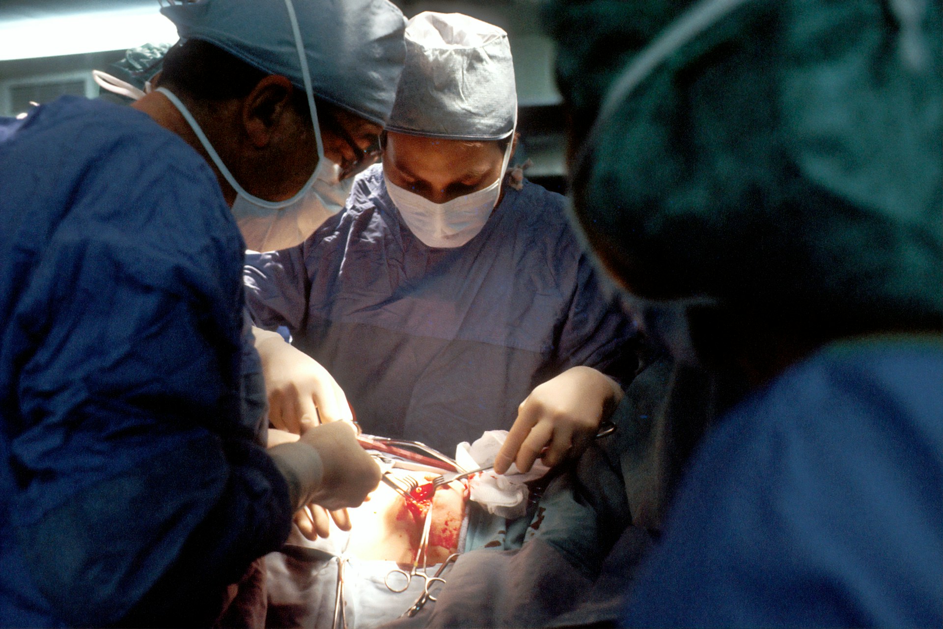 doctors performing surgery