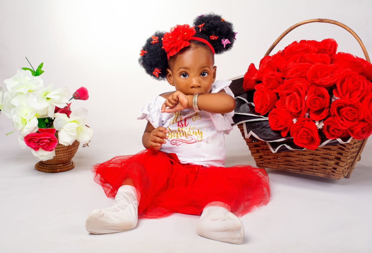 a little girl sitting