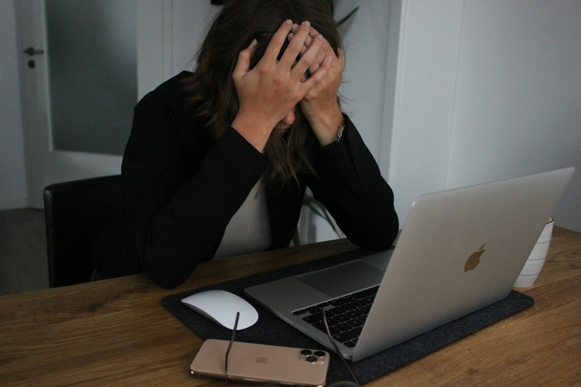 a frustrated mom with a laptop