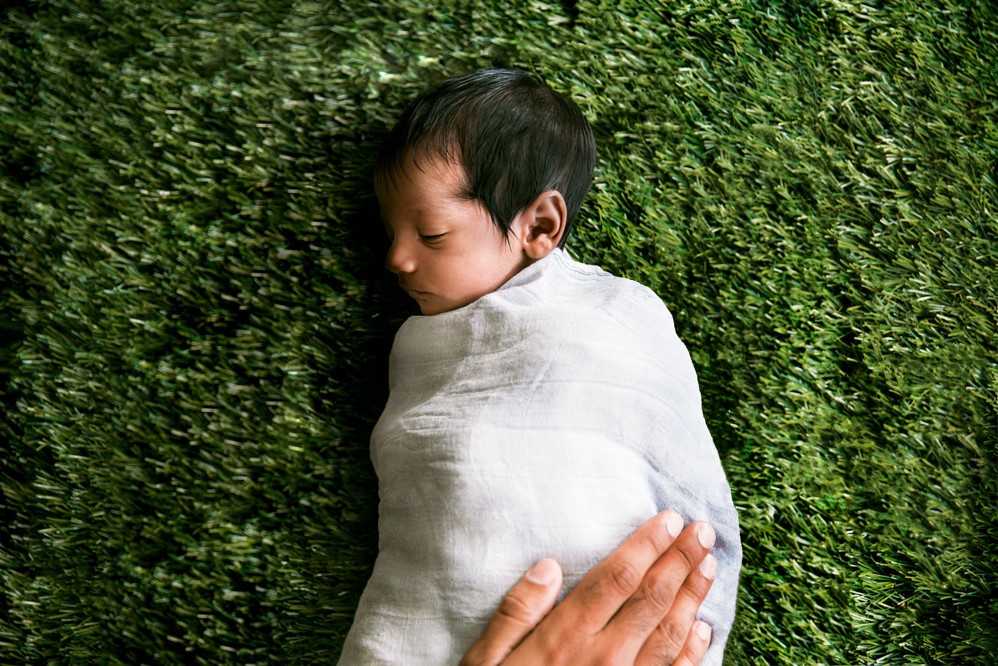 a baby wrapped in cloth
