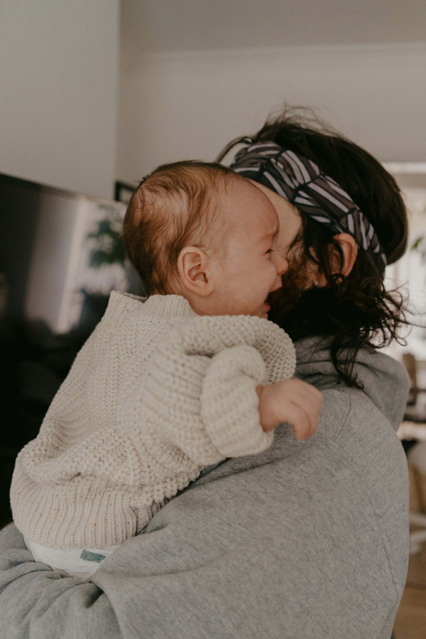 dad comforting baby